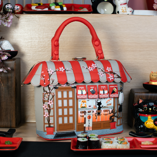 House-shaped bag with a sushi restaurant design on a wooden surface.