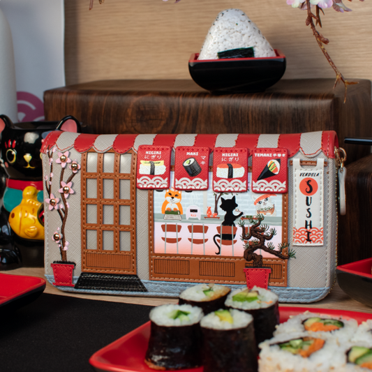 Sushi-themed pouch with cartoon characters on a table with sushi