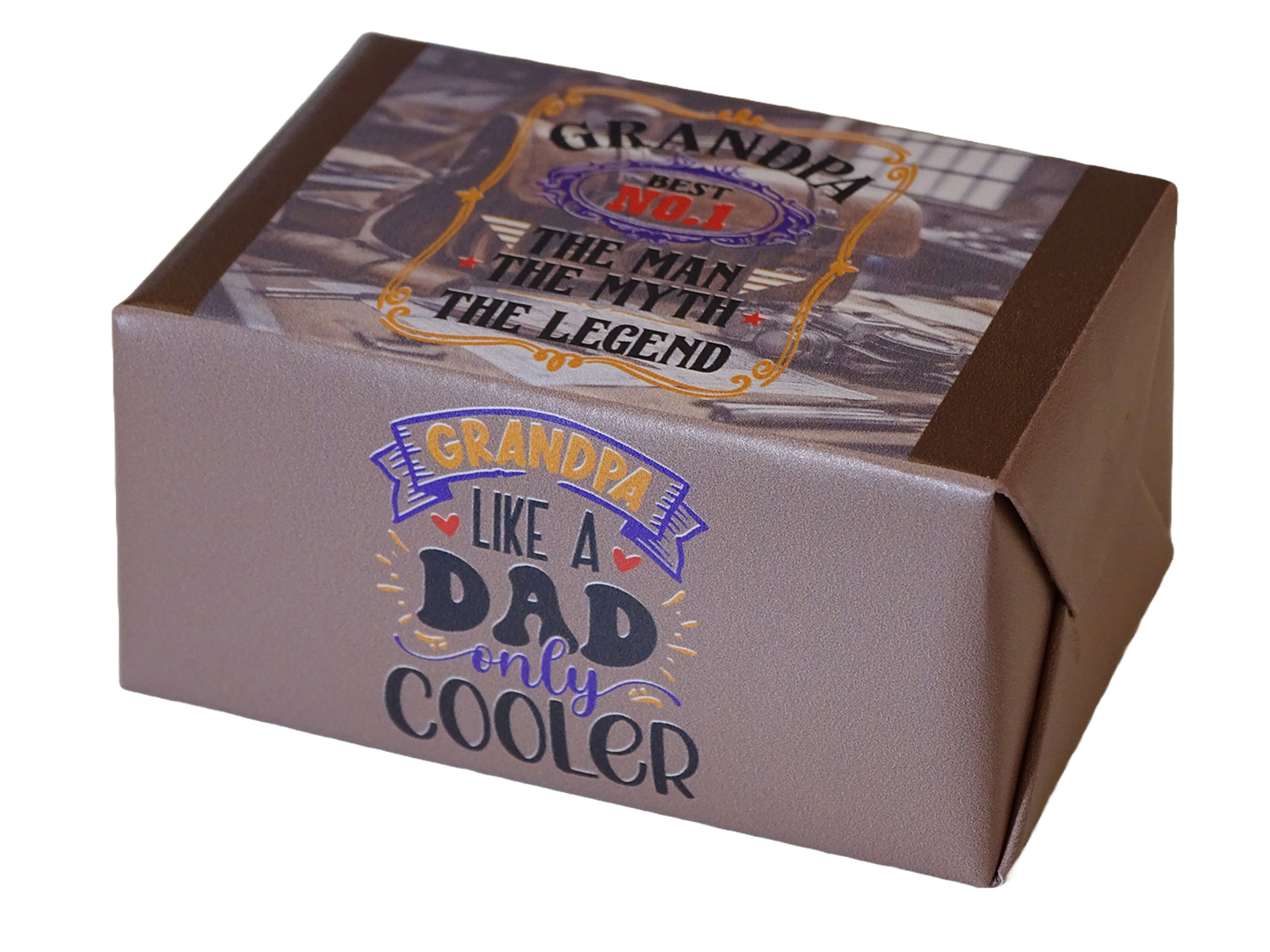 A square gift box with a metallic taupe-gray exterior and a printed top label. The front reads 'GRANDPA LIKE A DAD only COOLER' in stylized blue, purple, and yellow lettering.