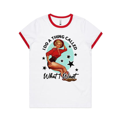 A white women's ringer tee with a graphic print of a 1950s style pin-up model on the front.