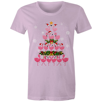 A women's black t-shirt with a printed design of pink flamingos forming a Christmas tree, with snow and Christmas decorations around.