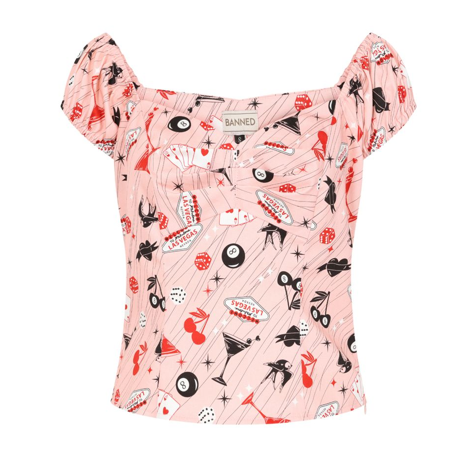 Pink children's swimsuit with a pattern on a white background