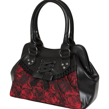 Black and red handbag with a red rose pattern on the lower half, black faux leather handles and trim, and lace-up front detail, shown on a white background.
