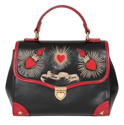 Black handbag with red accents and heart designs on a white background
