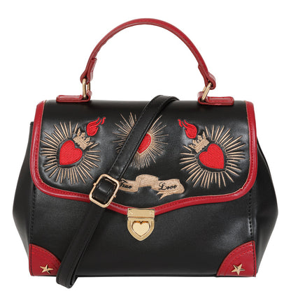 Black handbag with red accents and decorative elements on a white background