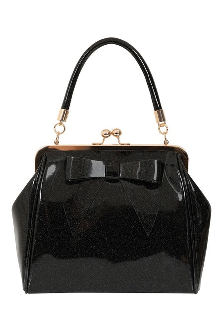 Black patent leather handbag with a bow detail on a white background