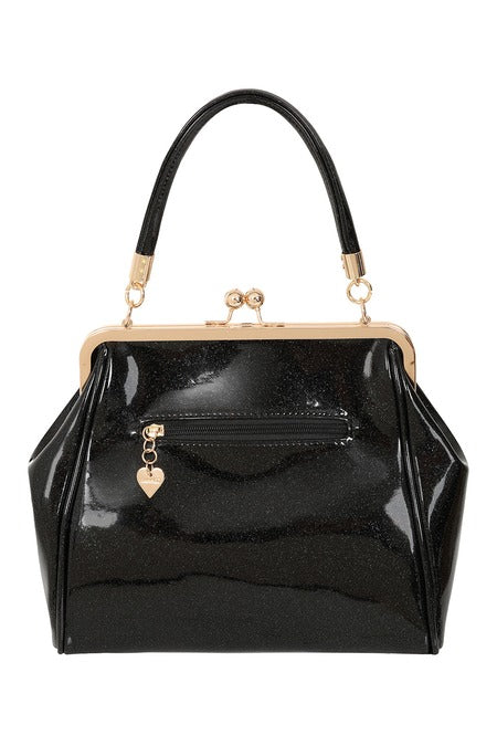 Black patent leather handbag with gold accents on a white background