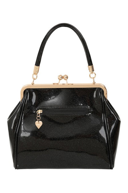 Black patent leather handbag with gold accents on a white background