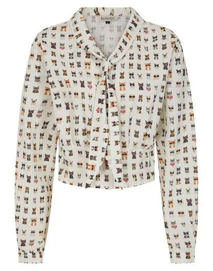 A long-sleeve button-up shirt by Sandro, featuring an all-over print of small dog illustrations on an off-white background.