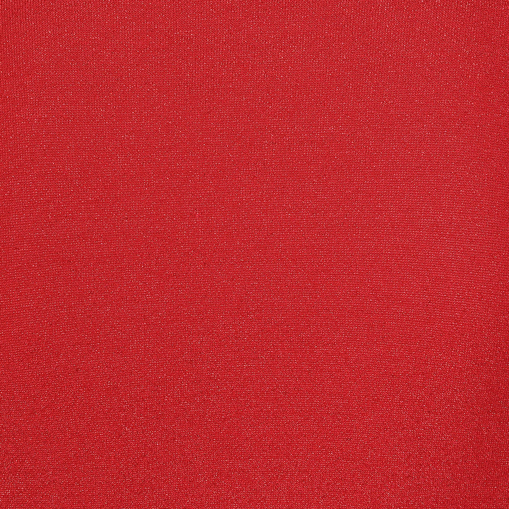 A close-up of a solid red textured fabric surface.