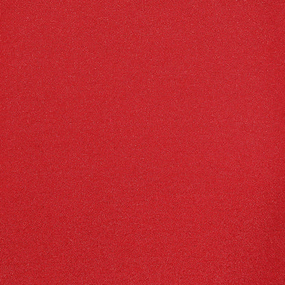 A close-up of a solid red textured fabric surface.