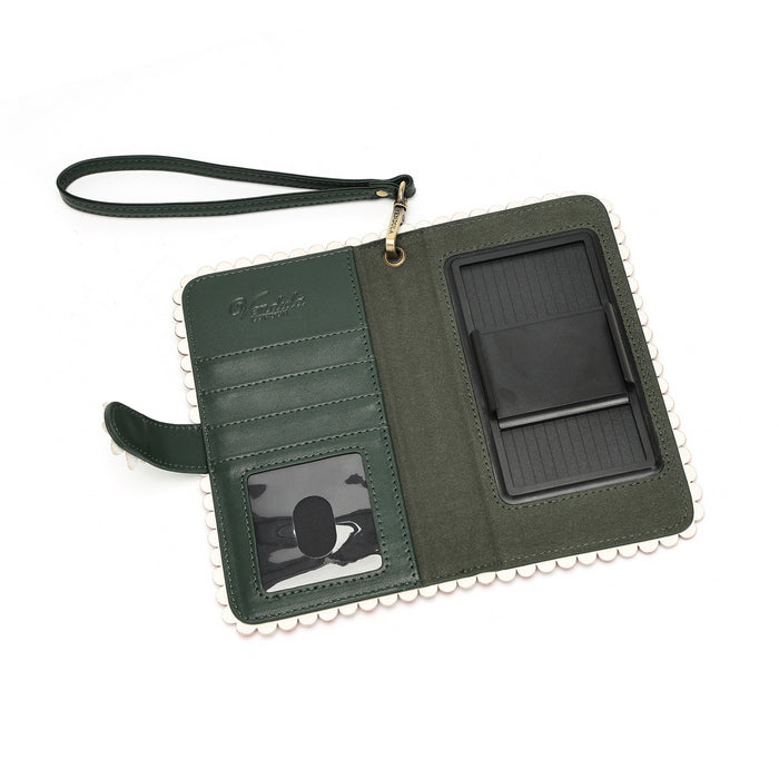 An open dark green leather wallet with a white beaded border, featuring a wrist strap, card slots, a clear ID window, and a black card holder on a white background.