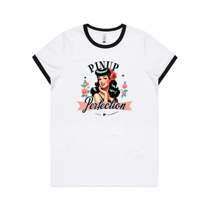 White ringer t-shirt featuring a retro pin-up girl graphic with the text 'PINUP Perfection' in black and pink script, surrounded by pink flowers and green leaves.