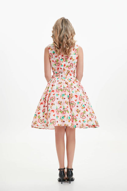 A woman wearing a knee-length sleeveless linen fit and flare dress with meerkat print pockets, a boat neckline, and an invisible zipper in the back. christmas dress xmas