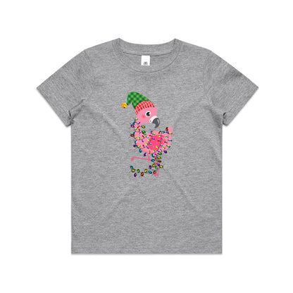 A pink cartoon flamingo wearing a green and red plaid Santa hat, wrapped in colorful Christmas lights, printed on a white fabric background.