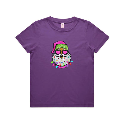 A festive embroidered Santa face design on fabric background. The Santa figure has a glittery pink Santa hat, heart-shaped pink glasses, a white beard decorated with colorful stars, and colorful Christmas lights around the bottom.