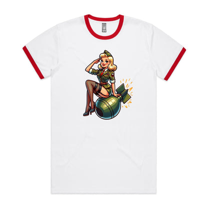 White ringer tee with red contrast at the neck and sleeve hems, featuring a graphic print of a pinup sitting on a bomb.