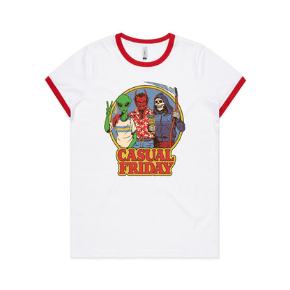 A white t-shirt featuring a colorful graphic print of three characters: a green alien smoking, a red devil in a red Hawaiian shirt holding a cocktail, and a skeleton in a purple hoodie holding a scythe. Below the illustration, the words 'CASUAL FRIDAY' are printed in large red letters with a yellow outline.