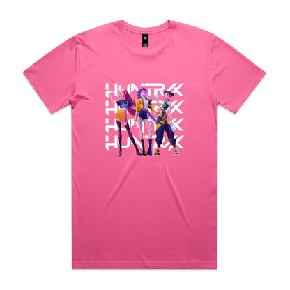 graphic t-shirt featuring three stylized female anime characters standing in front of a large white repeating 'HUNTRX' logo. The shirt fabric is visible, and the graphic is printed in vibrant shades of purple, yellow, orange, and black.