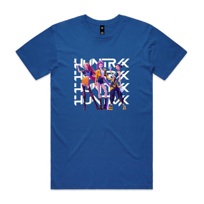 A blue graphic t-shirt featuring three stylized female anime characters standing in front of a large white repeating 'HUNTRX' logo. The shirt fabric is visible, and the graphic is printed in vibrant shades of purple, yellow, orange, and black.