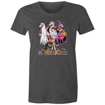 A white t-shirt featuring a colorful graphic of three cartoon flamingos dressed in Halloween costumes. One flamingo wears a white ghost and lantern, another is wrapped in bandages and holds a pumpkin bucket, and the third wears a purple witch hat and cape while holding a jack-o'-lantern.