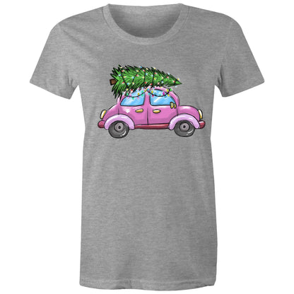A women's t-shirt with a printed image of a Christmas tree on the front, resembling a car, on a marled background.