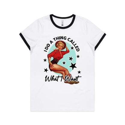 A white women's ringer tee with a graphic print of a 1950s style pin-up model on the front.