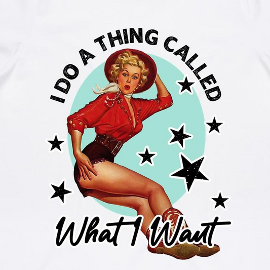 A white women's ringer tee with a graphic print of a 1950s style pin-up model on the front.