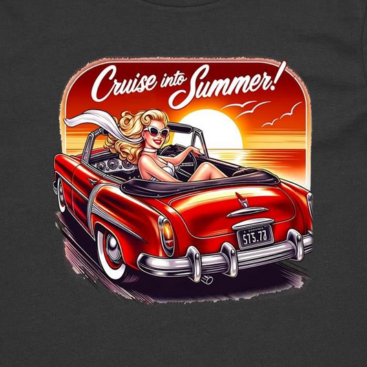 A graphic print on a black t-shirt featuring a retro-style illustration of a blonde woman in a red convertible car at sunset, with the text 'Cruise into Summer!' above.