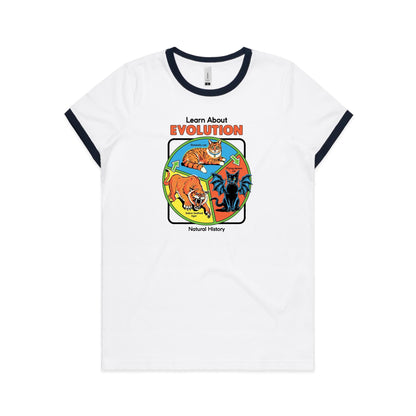 A white ringer t-shirt featuring a colorful educational graphic about evolution. The graphic shows a domestic cat, a flying demon cat, and a saber-toothed tiger arranged in a circle with the text 'Learn About EVOLUTION Natural History'.