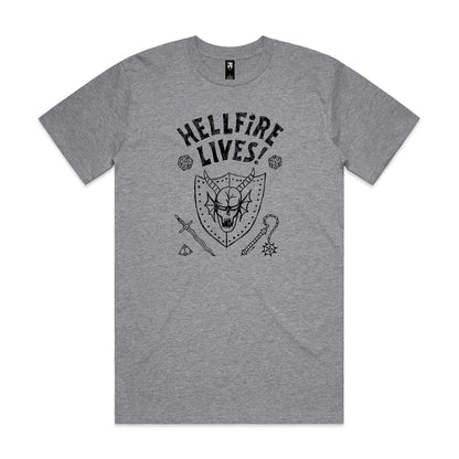 A close-up of a heather gray t-shirt featuring a black graphic print with the text 'HELLFIRE LIVES!' above a horned skull, dice, sword, and mace design.