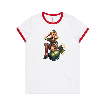 Women's white ringer tee with contrasting black ribbing at neck and sleeve hems, featuring a graphic of a pinup girl sitting on a bomb.
