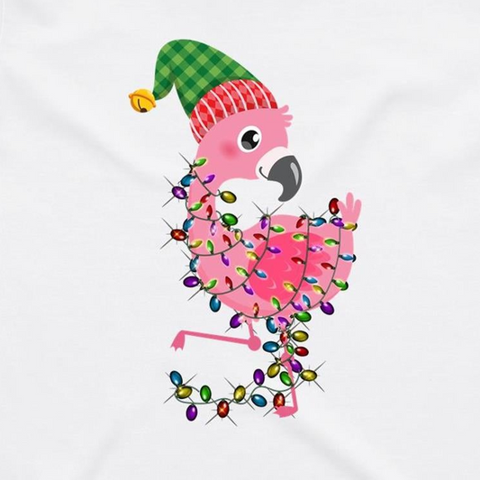 A pink cartoon flamingo wearing a green and red plaid Santa hat, wrapped in colorful Christmas lights, printed on a white fabric background.