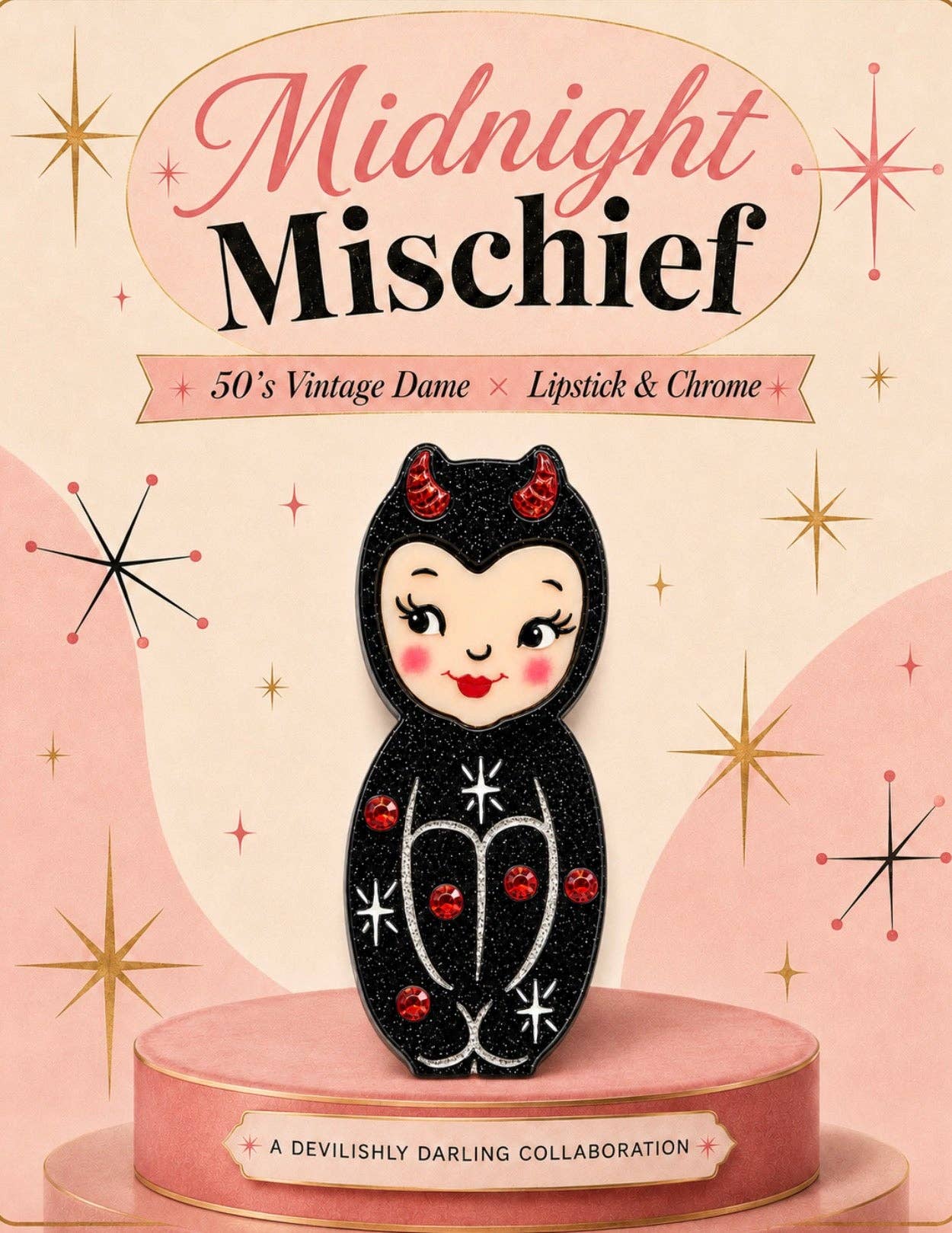 A retro-style product graphic for a lip product called Midnight Mischief, featuring a black glittery doll with red gems and white stars on a pink and cream background with starbursts. Text reads 'Midnight Mischief,' '50's Vintage Dame x Lipstick & Chrome,' and 'A Devilishly Darling Collaboration.