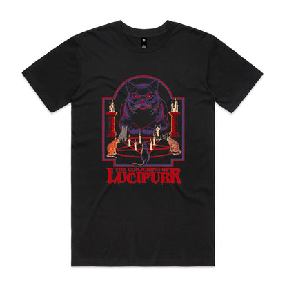 A black graphic print featuring a large purple cat with glowing red eyes sitting above a pentagram and candles, with smaller cats around it and the text 'THE CONJURING OF LUCIPURR' in red at the bottom.