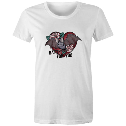 A pink women's t-shirt with a graphic print of a vampire bat and cherry blossoms, and the text 'BATTY FOR YOU'.
