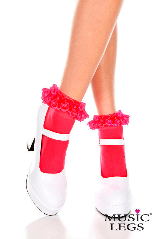 Red and white socks with ruffles worn by a person on a white background, featuring the brand 'Music Legs'.