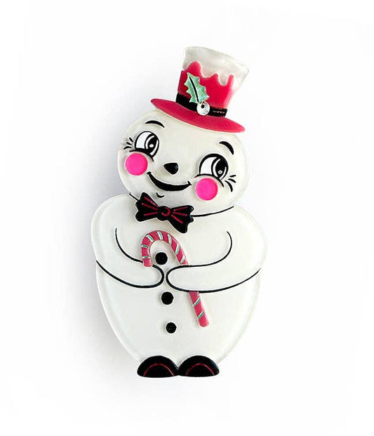 A white snowman figurine or ornament with a red top hat, black bow tie, pink cheeks, and a candy cane, shown on a plain white background.