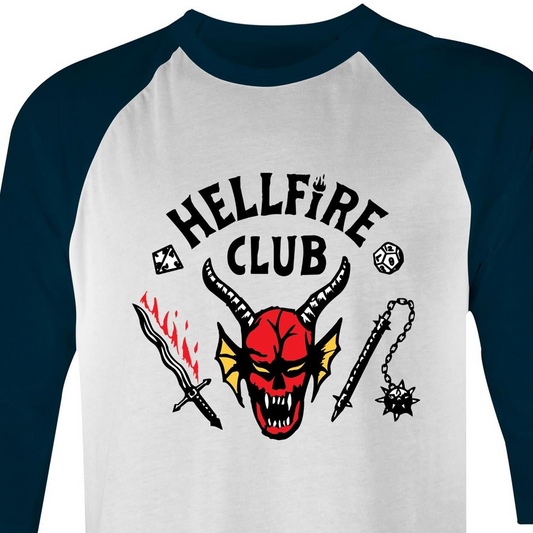 A 3/4 sleeve raglan t-shirt with a white body and dark navy blue sleeves. The front features a graphic print of a red horned devil skull with the text 'HELLFIRE CLUB' in black arched above it, flanked by a flaming sword and a mace.
