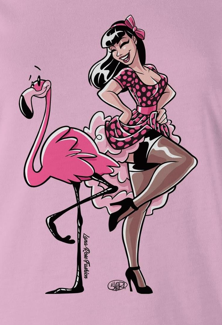 A pink graphic print featuring a retro pin-up style woman in a pink polka-dot dress posing next to a pink flamingo. The artwork includes black outlines and stylized shading, with a pink background.