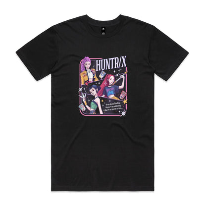 A close-up of a graphic t-shirt featuring three illustrated anime-style female characters with colorful hair and outfits, surrounded by stars and the text 'HUNTR/X'.