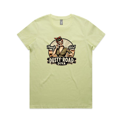 A graphic print on a white background featuring a retro-style pinup illustration of a woman with sunglasses, a red bandana, and an olive green shirt, with the text 'Pinup Girl' and 'Dusty Road Diva'.