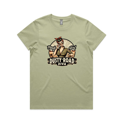 A graphic print on a white background featuring a retro-style pinup illustration of a woman with sunglasses, a red bandana, and an olive green shirt, with the text 'Pinup Girl' and 'Dusty Road Diva'.