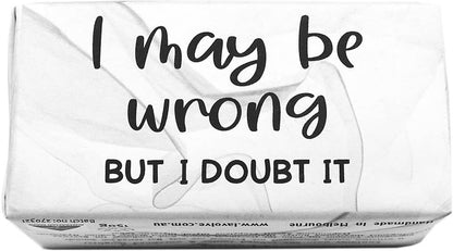 A white rectangular box with black printed text reading 'I may be wrong BUT I DOUBT IT' on a plain white background.