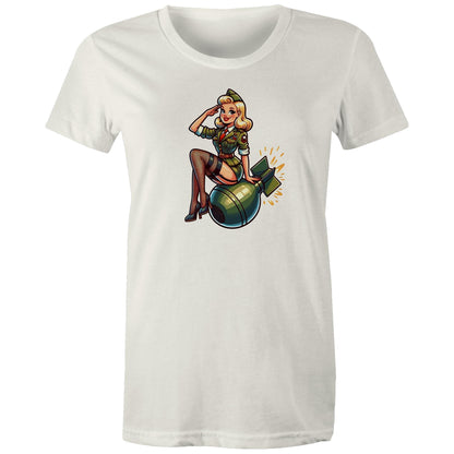 Women's green t-shirt with a vintage style pinup illustration of a female character sitting next to a bomb, on a maple green background.