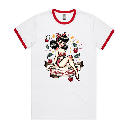 A white crew neck t-shirt with a printed graphic of a pin-up style illustration featuring a female character with cherry blossoms and the text 'CHERRY BOMB'.
