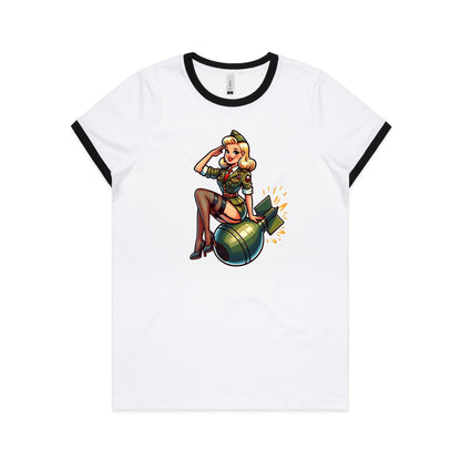 Women's white ringer tee with contrasting black ribbing at neck and sleeve hems, featuring a graphic of a pinup girl sitting on a bomb.