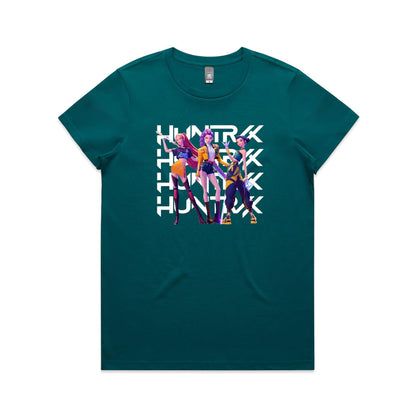 A close-up of a t-shirt featuring a graphic print of three stylized female characters in colorful outfits, overlaid with the word 'HUNTER' repeated vertically in bold white letters.