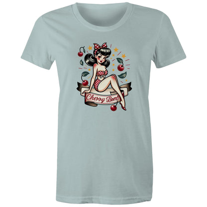 A black women's t-shirt with a printed graphic of a pinup style illustration featuring a character with a bow and stars, and the text 'Cherry Bomb'.