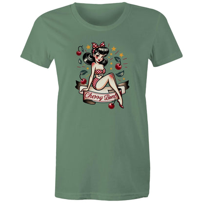 A black women's t-shirt with a printed graphic of a pinup style illustration featuring a character with a bow and stars, and the text 'Cherry Bomb'.